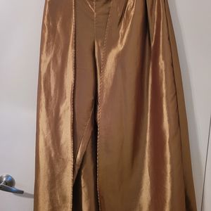 Gold pants with attached skirt.